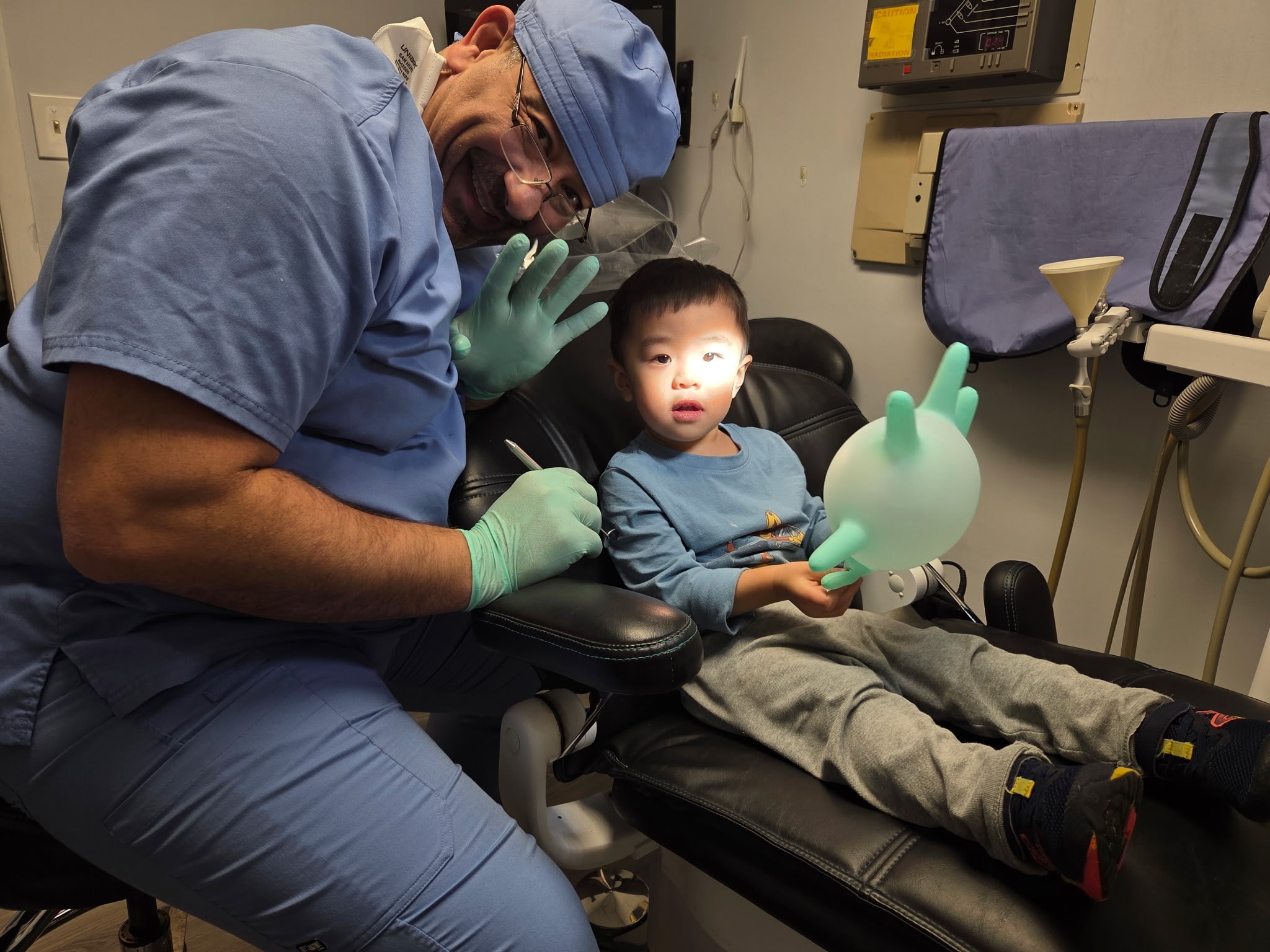 Dr. Rami Rizk in his dental office at Allendale Family & Cosmetic Dentistry